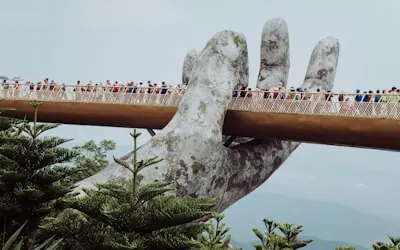 people walking on bridge during daytime · 지역 전경, 숙소 사진 아님